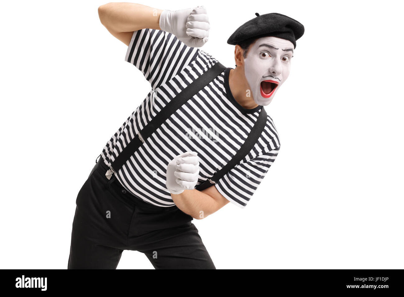 Mime behind an imaginary panel isolated on white background Stock Photo