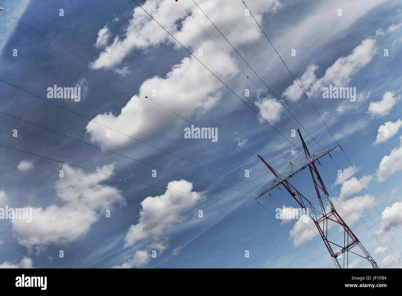 Pylon and high-voltage power line on sky background Stock Photo - Alamy