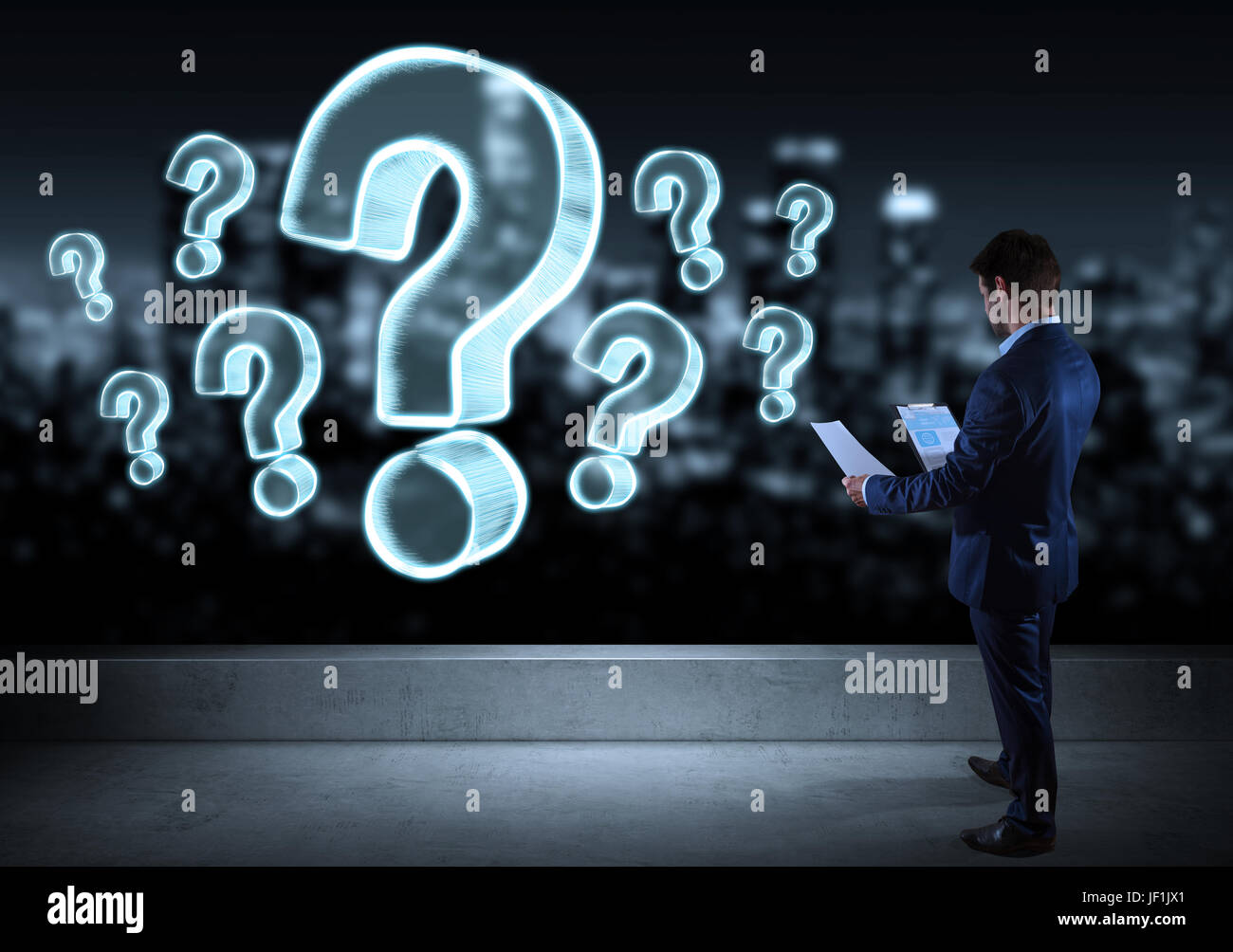 Businessman watching question marks sketch on a rooftop with a city view 3D rendering Stock Photo