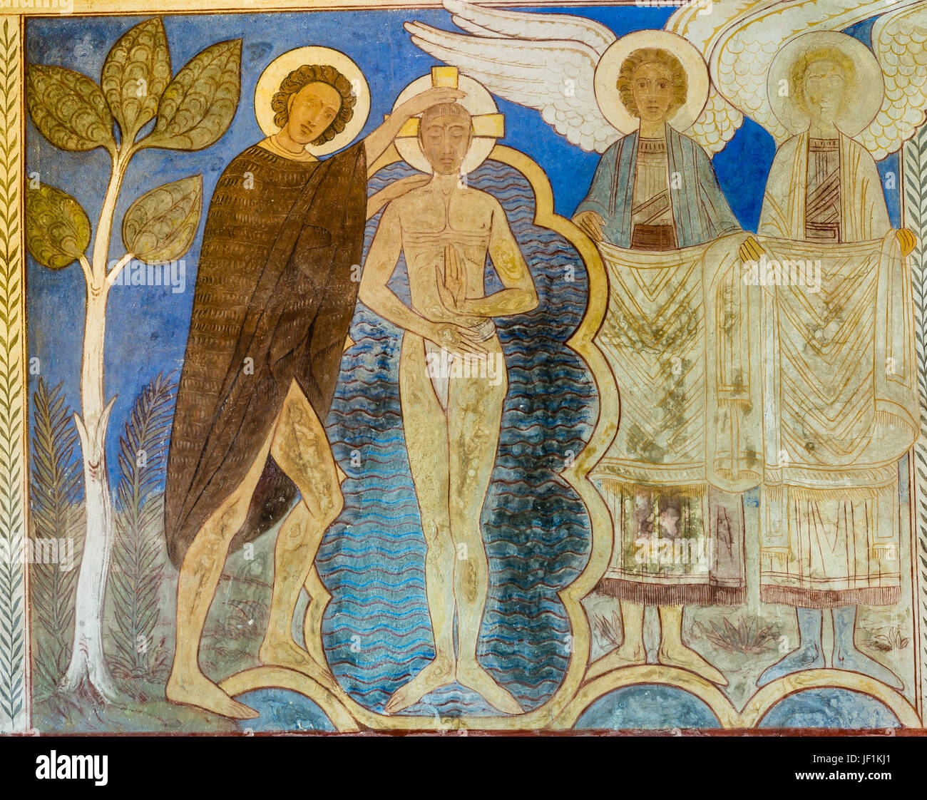 Baptism of Jesus in the Jordan river, romanescque fresco in Jelling church Denmark, June 26, 2017 Stock Photo