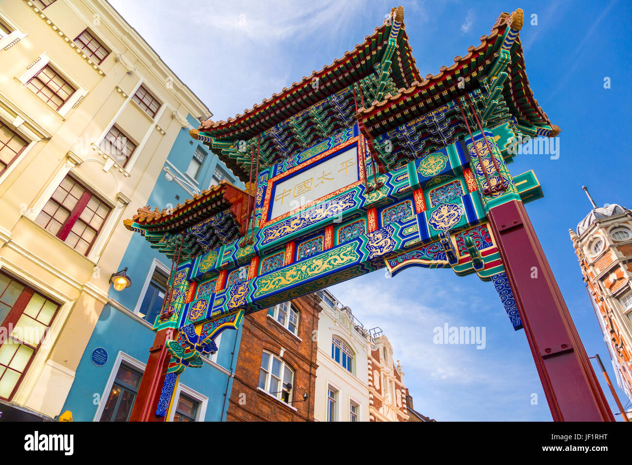Colourful oriental style gate into Chinatown, London, UK Stock Photo