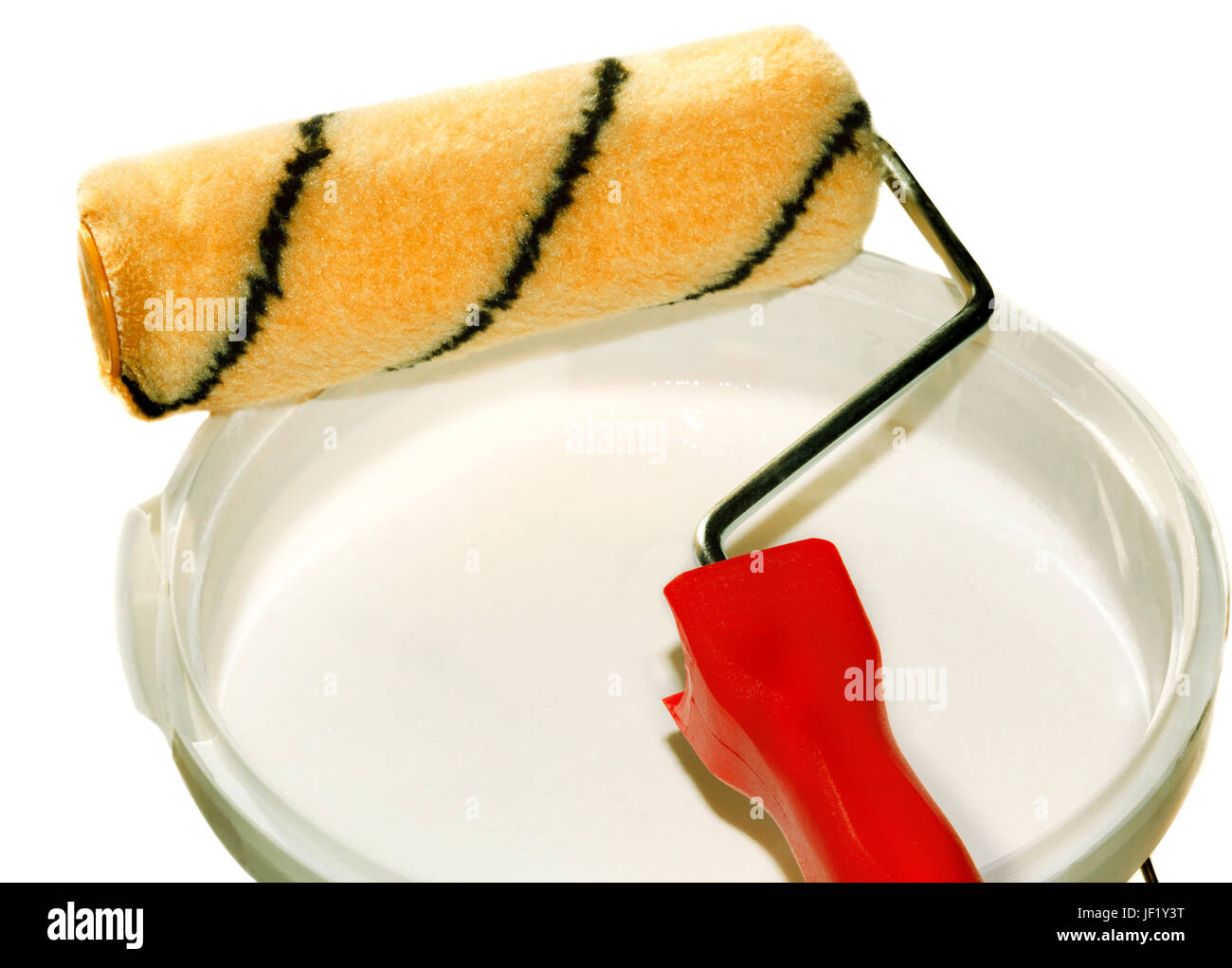 Paint roller on a bucket with paint Stock Photo Alamy