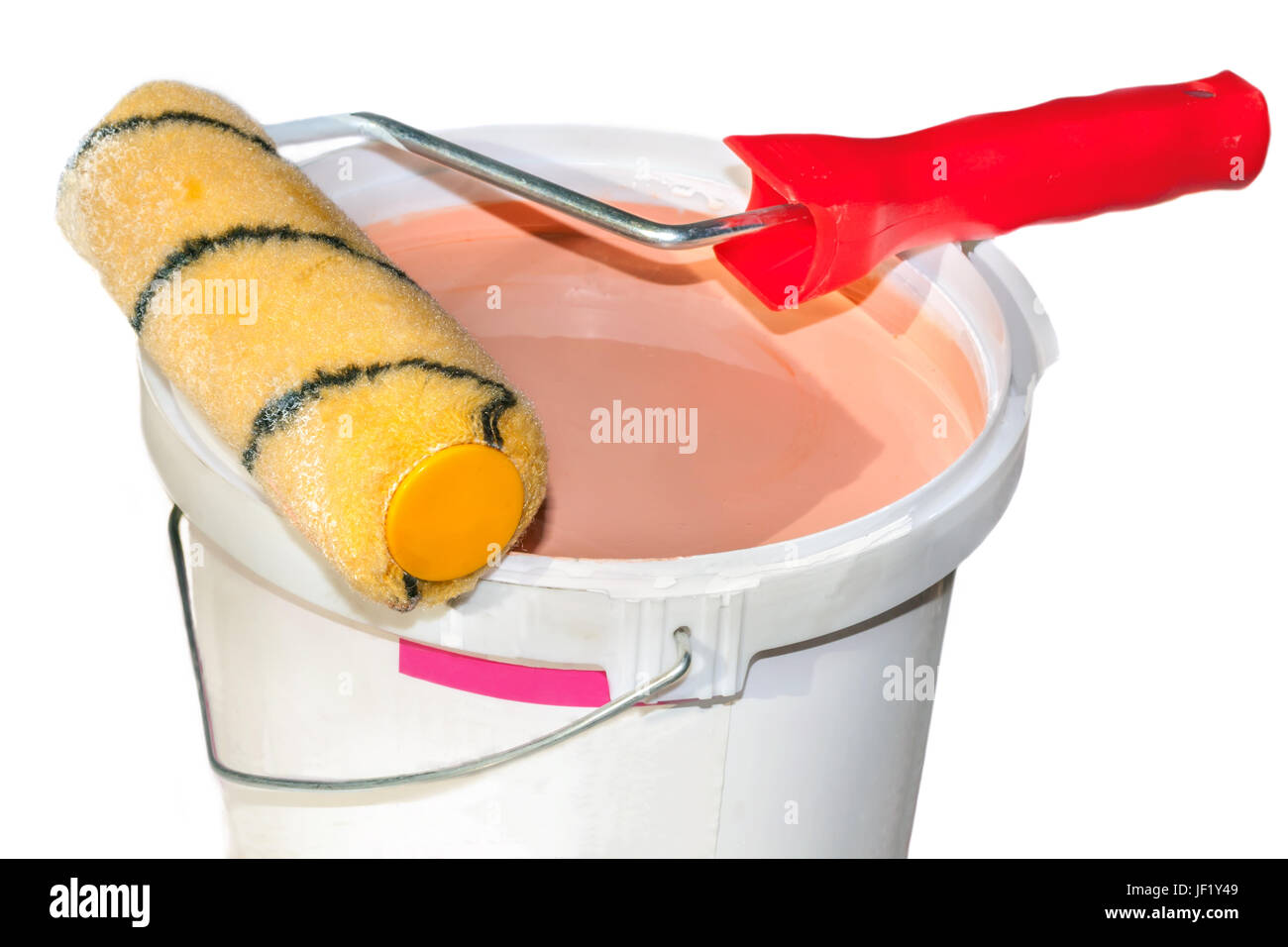 Paint roller on a bucket with paint Stock Photo Alamy