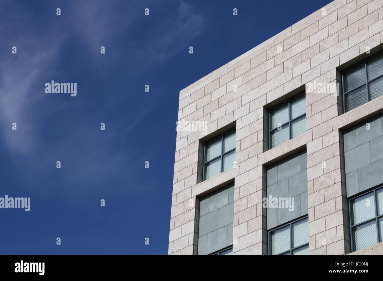 Modern building against blue sky Stock Photo - Alamy