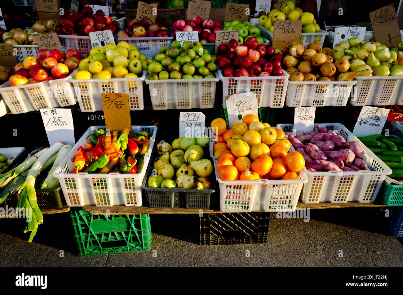 Oriental green grocer's outdoor stall showing various fruits and vegetables Stock Photo Alamy