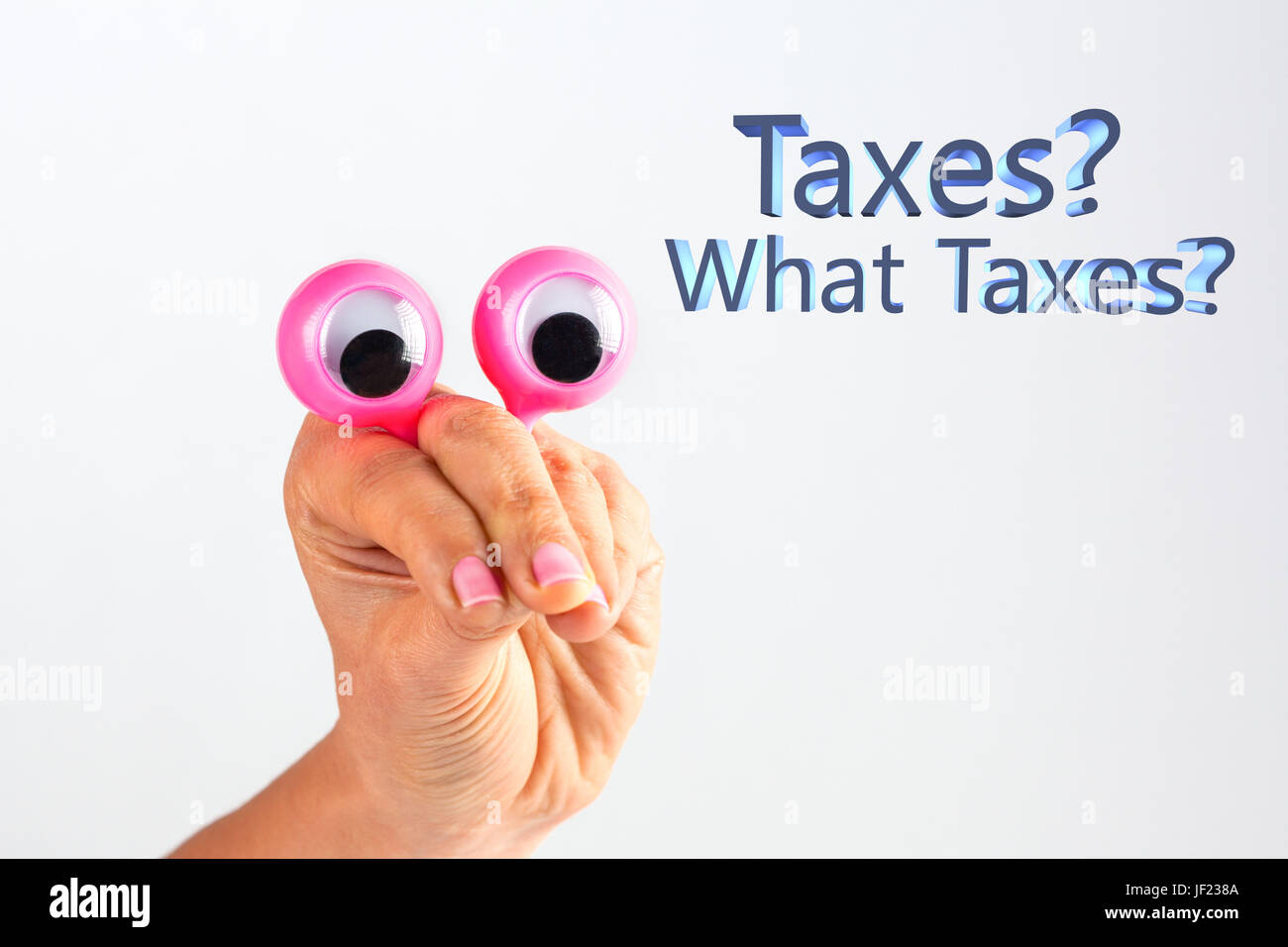 Funny character creature looking surprised and amused depicted with female hand and googly eyes with text Taxes? What Taxes? Tax avoidance concept Stock Photo