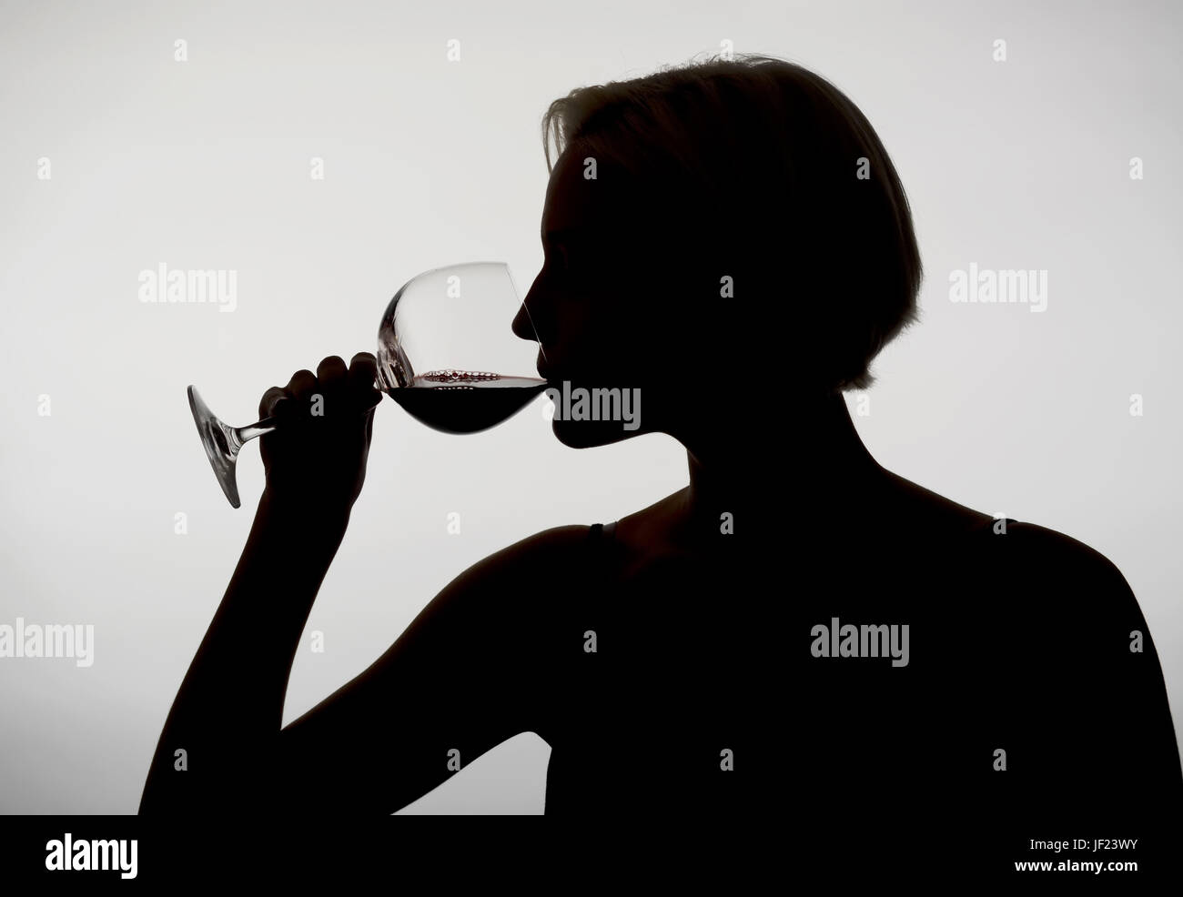 woman drinking red wine Stock Photo