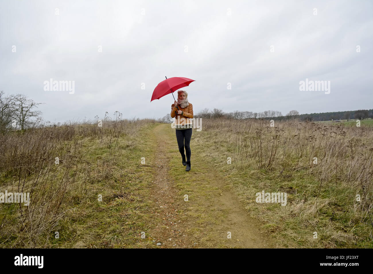 woman with umbrella Stock Photo - Alamy