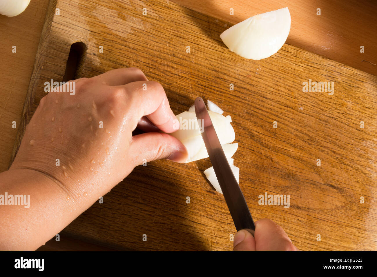 Cutting and chopping an onion Stock Photo