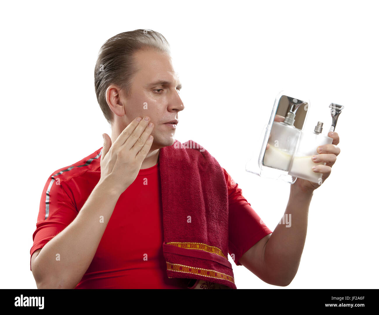 man has a shave with the razor Stock Photo