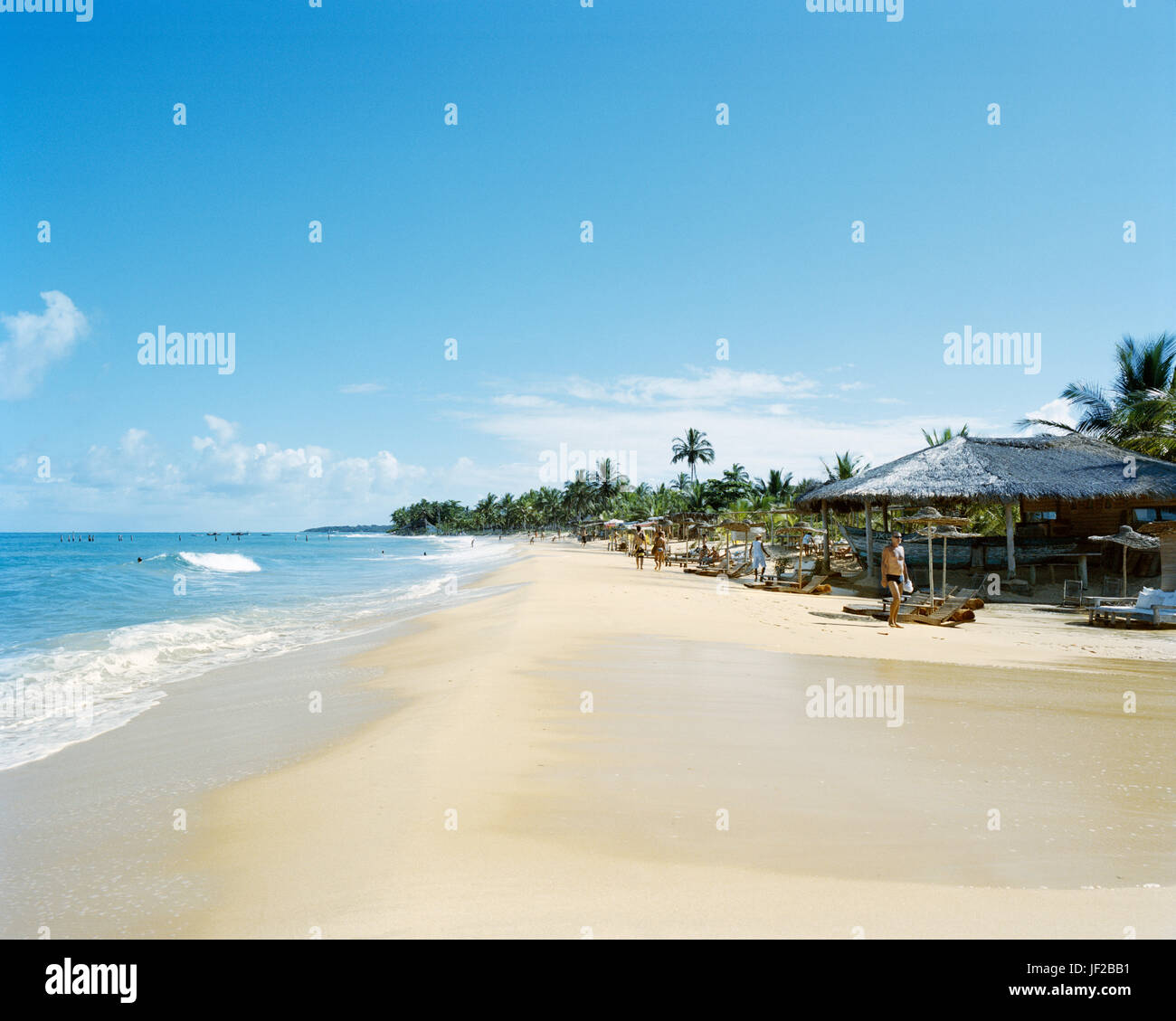 People on sandy beach Stock Photo