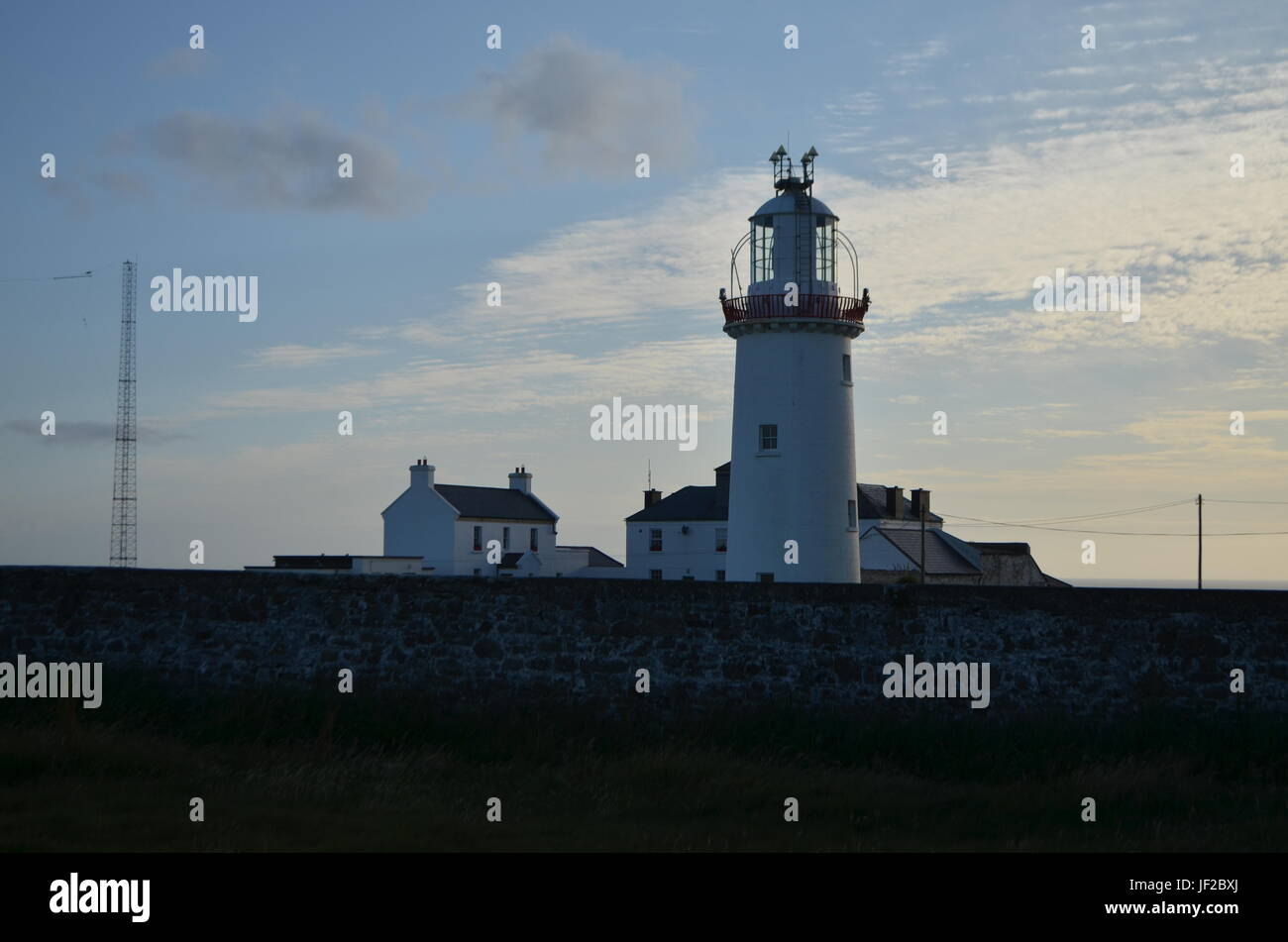 Loop Head Lighthouse and Lightkeeper’s House in Clare, Ireland Stock