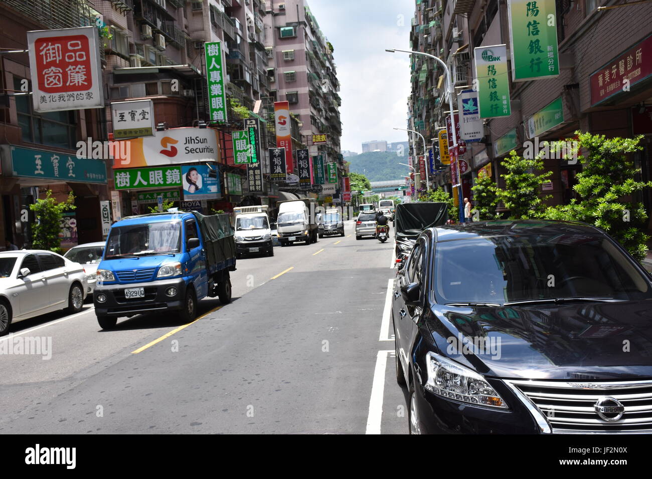 A typical street in Taiwan, called Shin Fa road, which is the main street of New Taipei City. Stock Photo