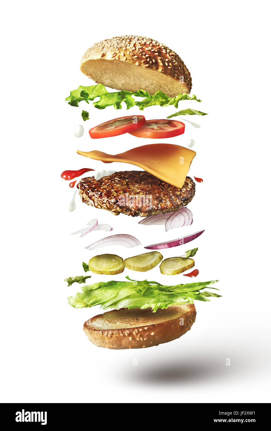 Vertrouwen besteden Distributie Delicious hamburger with flying ingredients Stock Photo - Alamy