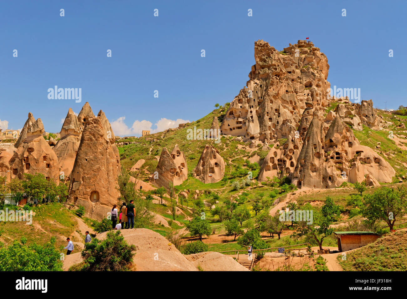 Cave dwellings known as Uchisar Castle at Uchisar in the Goreme National Park, Cappadocia, Turkey. Stock Photo