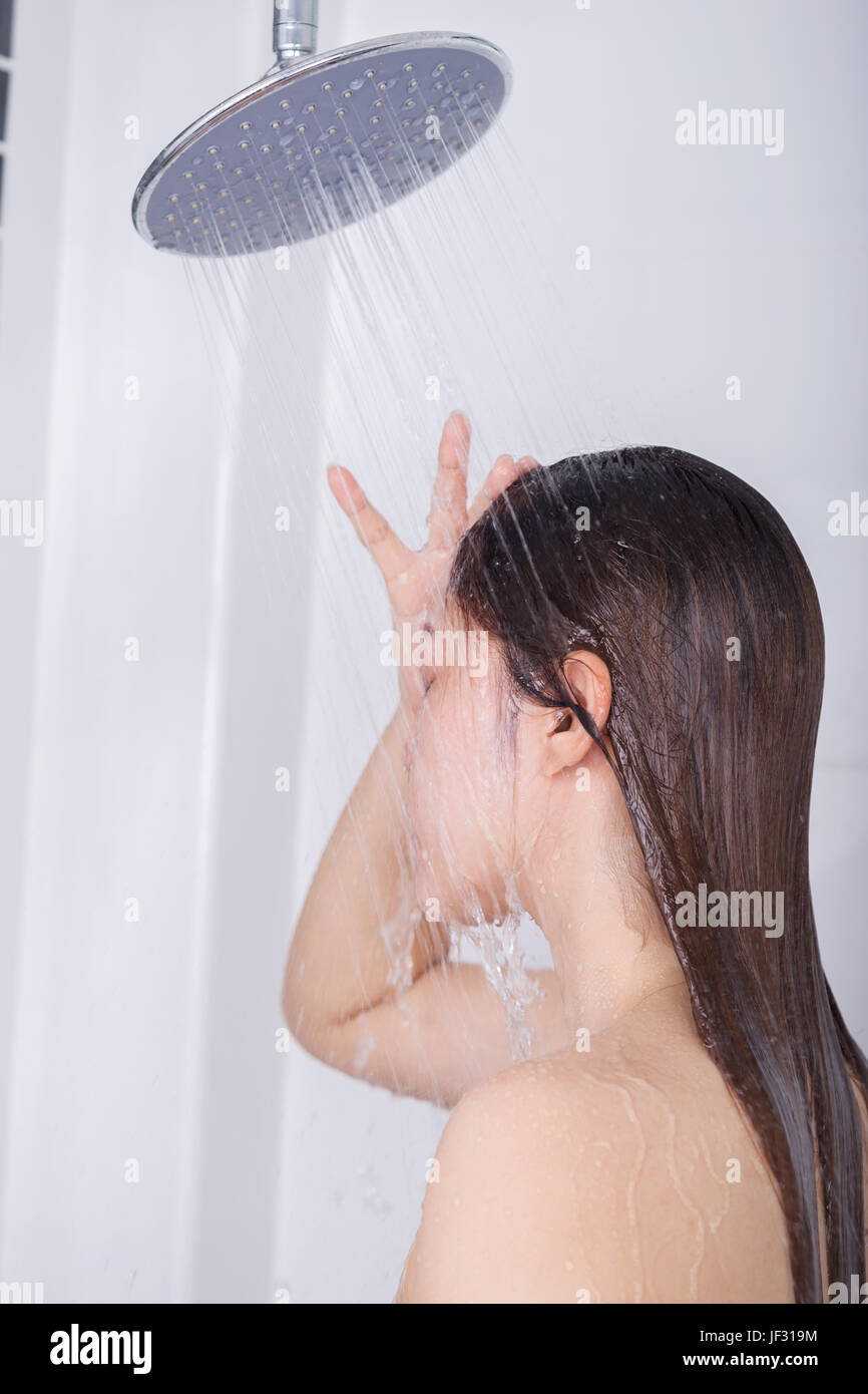 Woman showering head shower hires stock photography and images Alamy