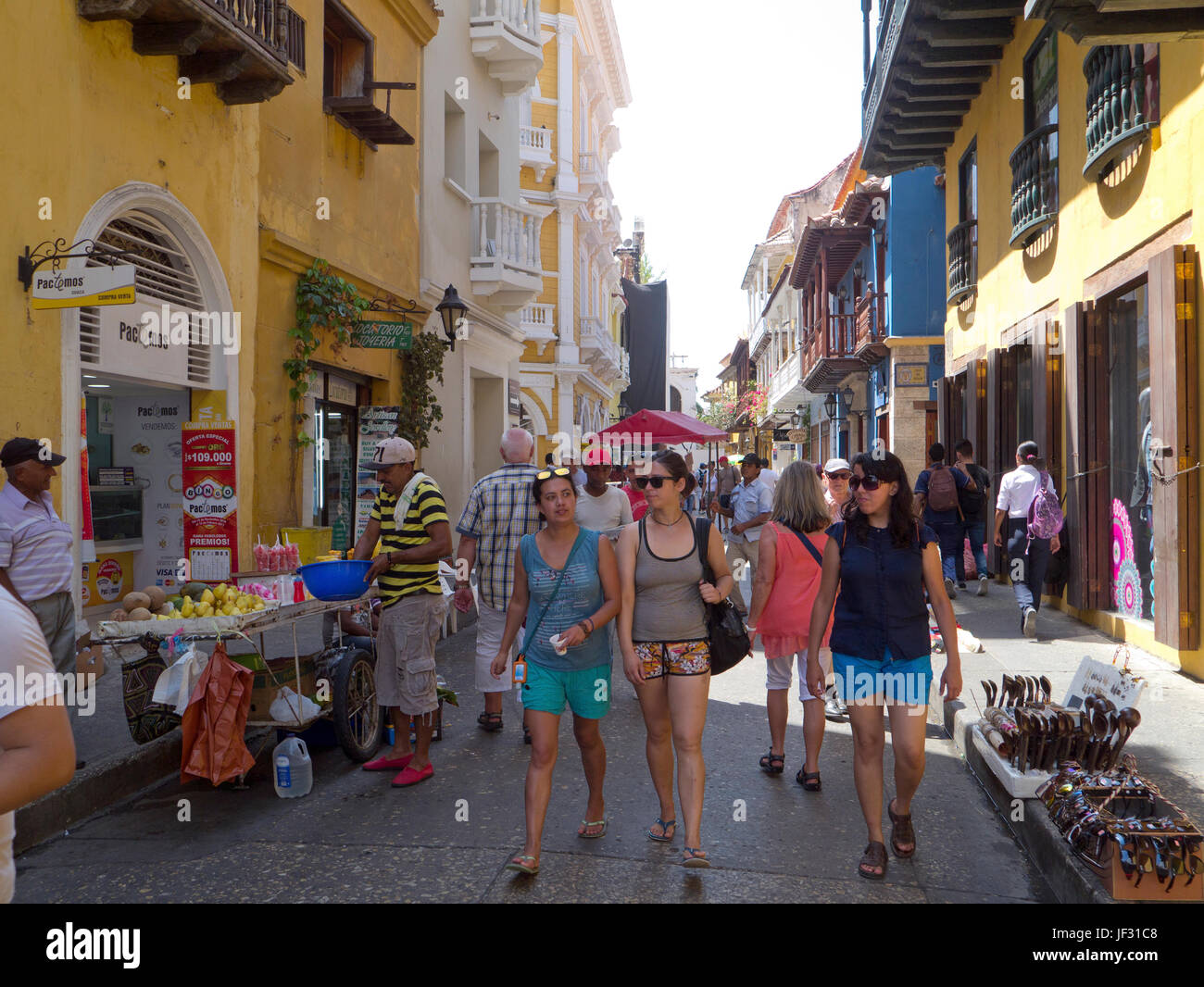 Street vendors with tourists, Cartegena, Colombia Stock Photo