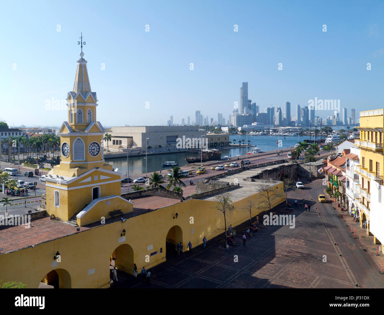 Plaza de los Coches, old city entrance with new city skyline in back ground, Cartegena, Colombia Stock Photo