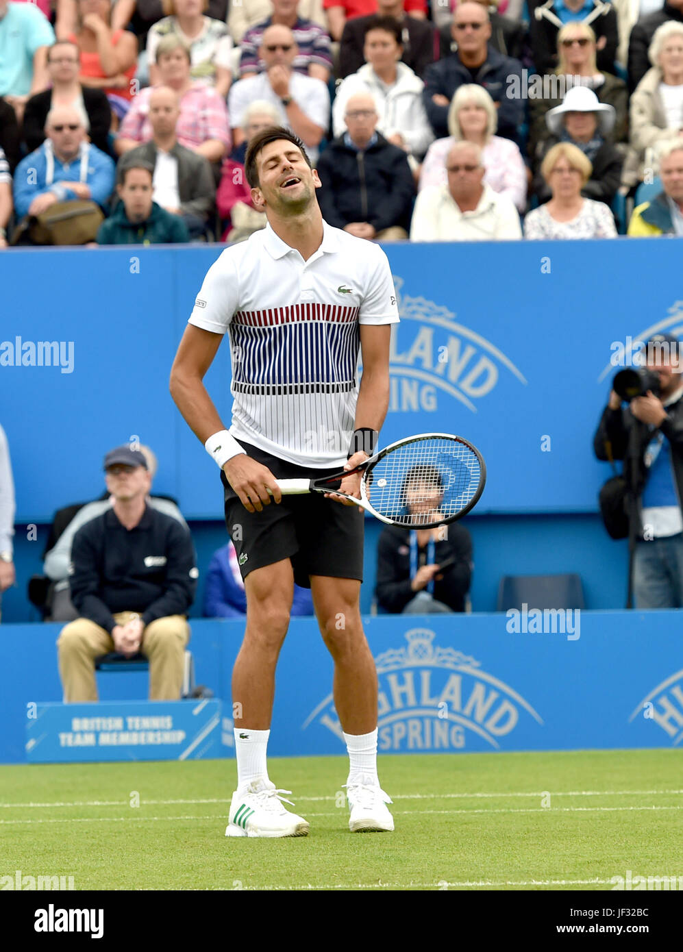 Novak Djokovic of Serbia in action at the Aegon International Eastbourne tennis tournament at Devonshire Park , Eastbourne Sussex UK . 28 Jun 2017 Photograph taken by Simon Dack Stock Photo