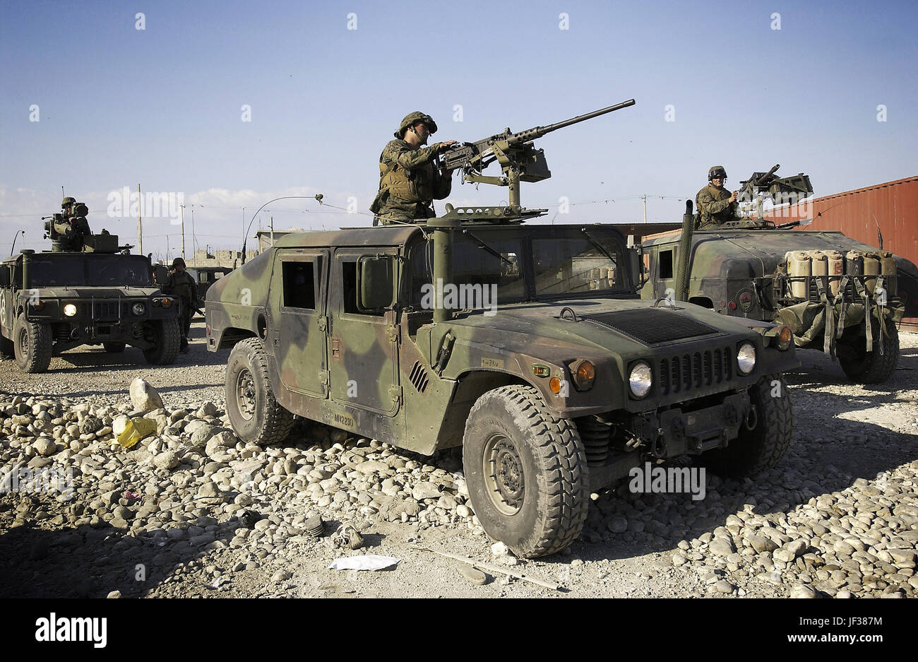 040306-F-2828D-269    U.S. Marines from the 3rd Battalion, 8th Marine Regiment, Camp Lejeune, N.C., are on patrol at the port in Port-au-Prince, Haiti, on March 6, 2004.  U.S. troops are deploying to Haiti at the request of the new President of Haiti to help promote the constitutional political process, to create conditions for the arrival of the U.N. multinational force, facilitate humanitarian assistance and secure key sites in the Haitian capital of Port-au-Prince.  DoD photo by Tech. Sgt. Andy Dunaway, U.S. Air Force.  (Released) Stock Photo