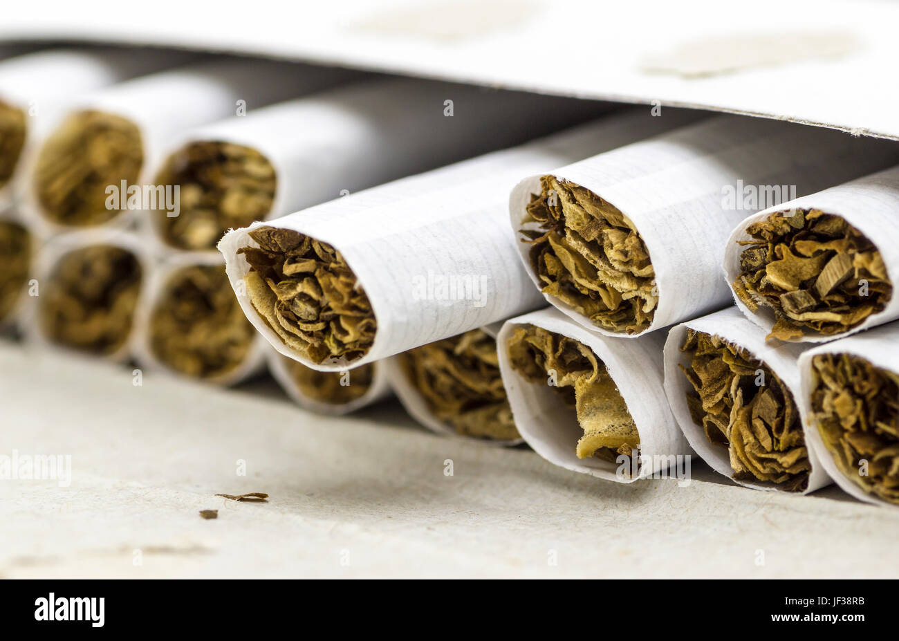 cigarettes without filters The open pack of cigarettes without filter closeup Stock Photo