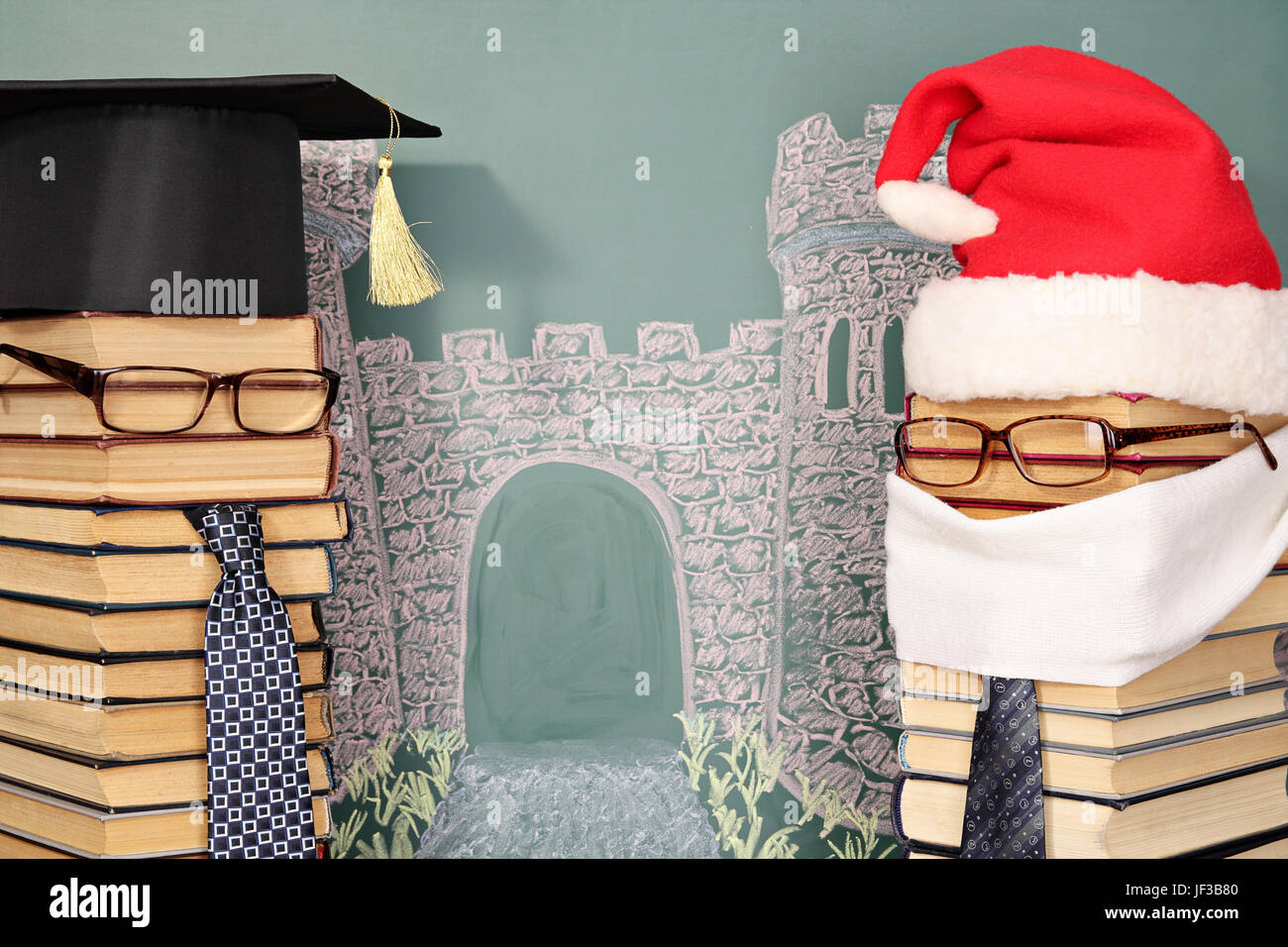 Unusual Santa Claus and professor from books before blackboard with drawing chalk of gate to future Stock Photo