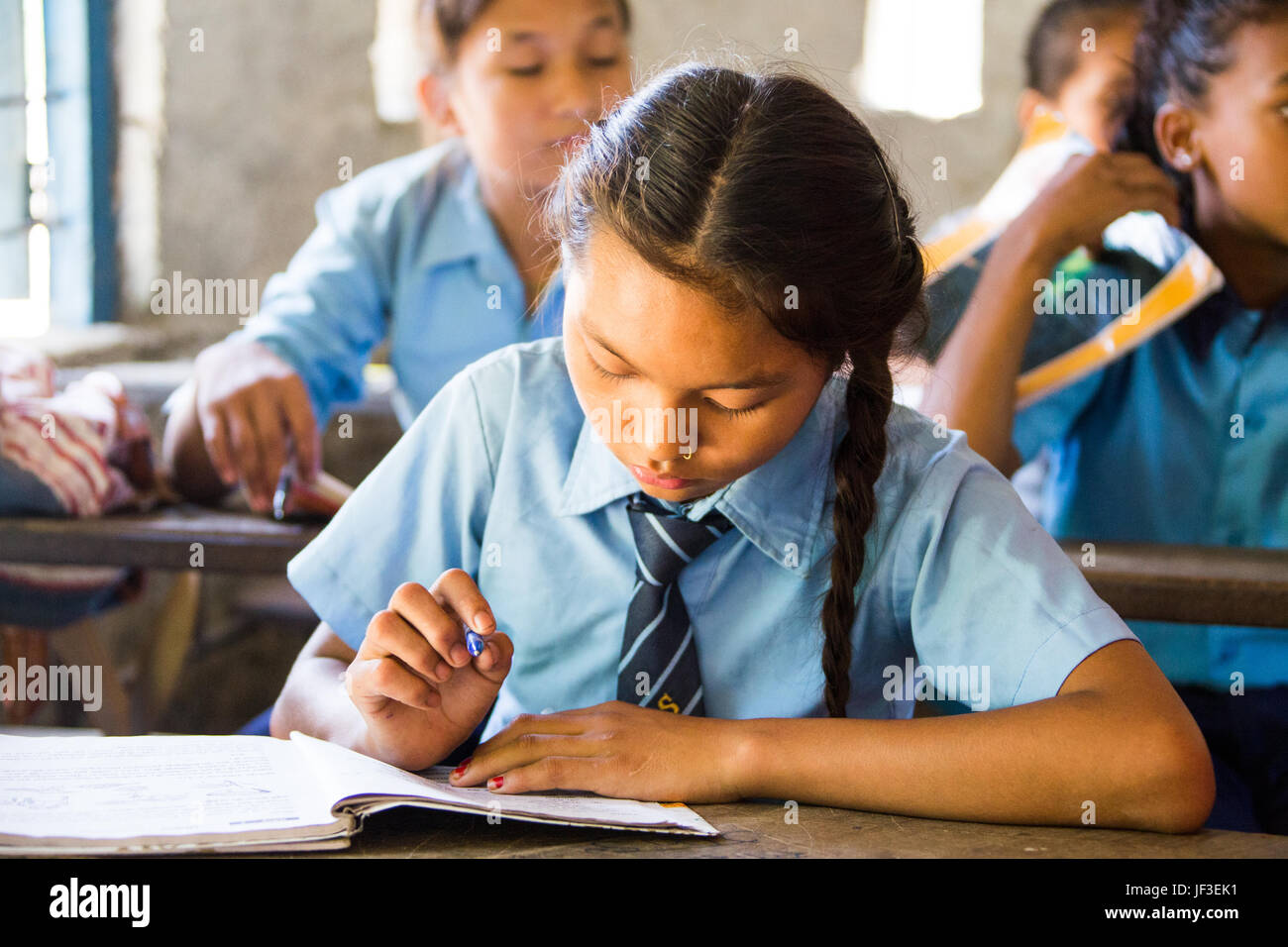 Student in class in Tanahu District, rural Nepal Stock Photo