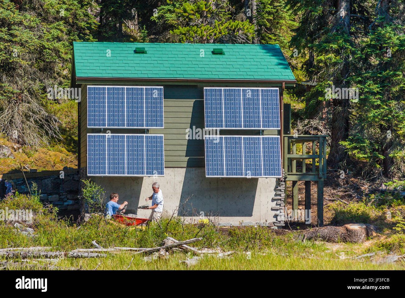 Solar Powered Outhouse facility across from Spirit Island on Maligne Lake in Canada. Maligne Lake is the largest natural lake in the Canadian Rockies. Stock Photo