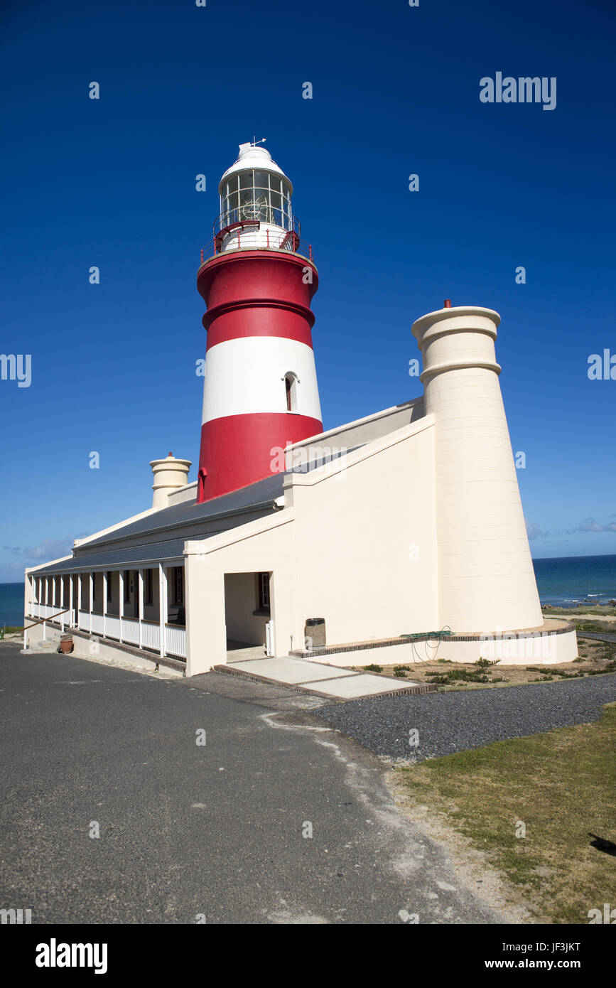 L'Agulhas Lighthouse against blue sky Stock Photo