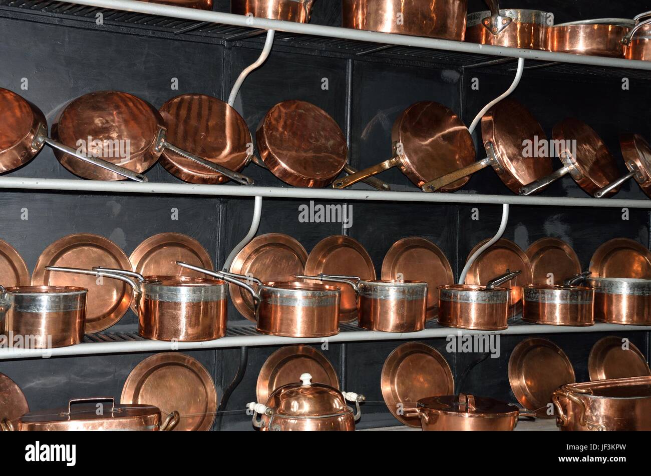 Large collection of Antique cooking pots Stock Photo Alamy