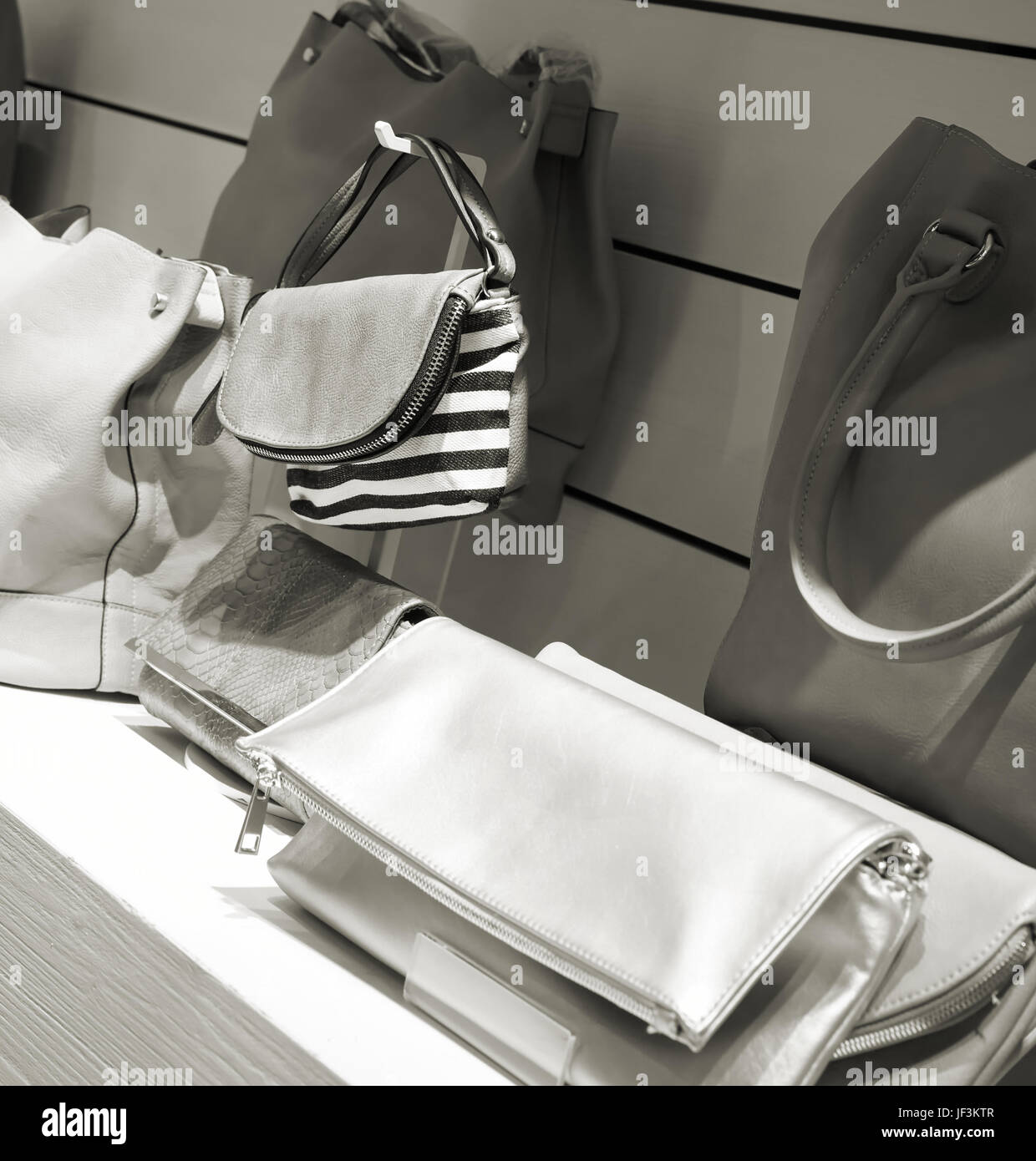 Handbags in a shelf in the store Stock Photo