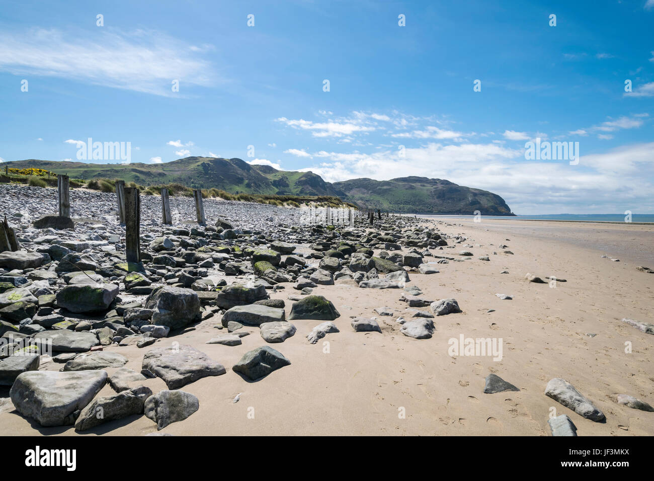 Conwy Morfa beach with Penmaen bach point in the distance Stock Photo