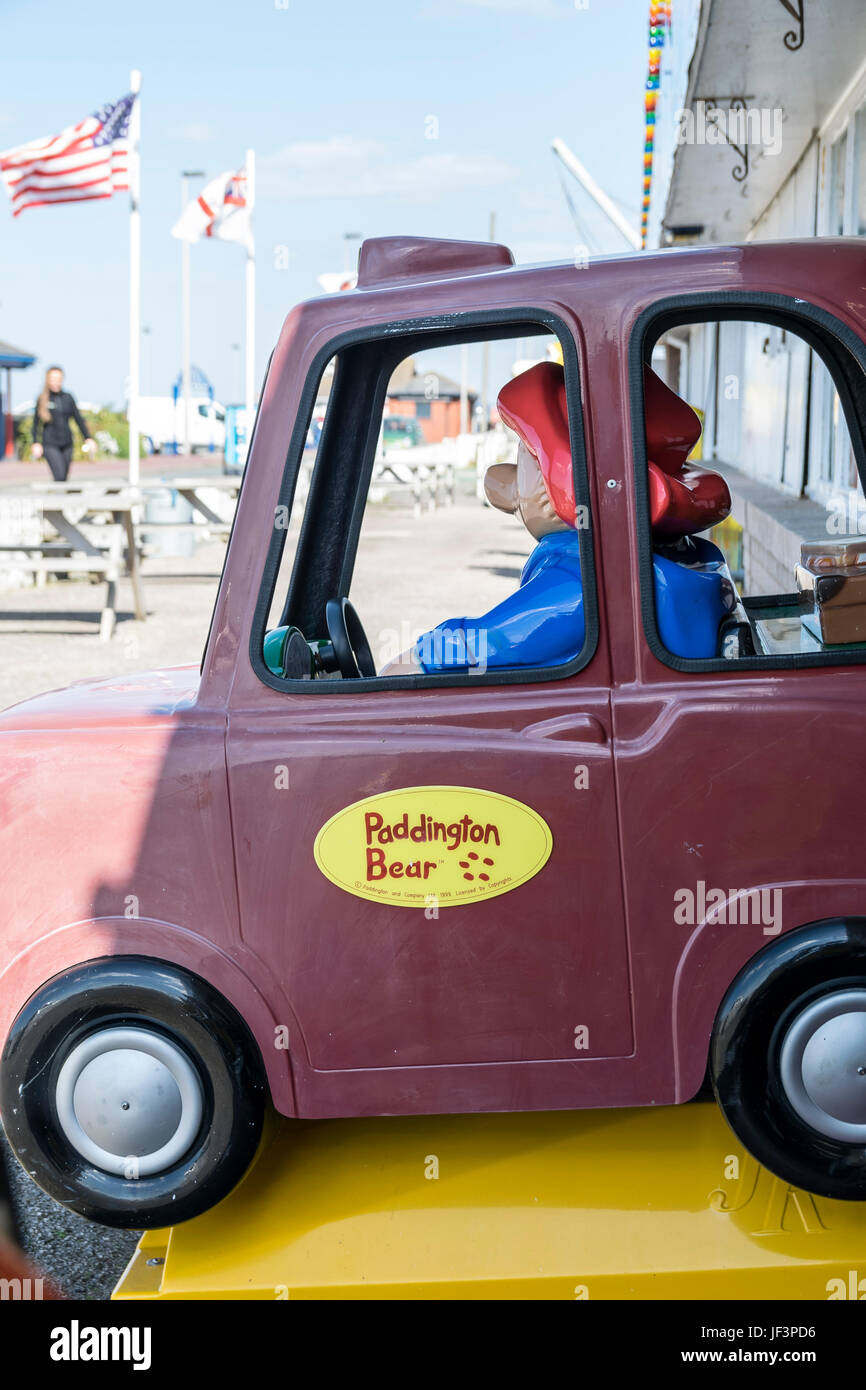 Paddington bear childrens Amusement  ride at the seaside Stock Photo