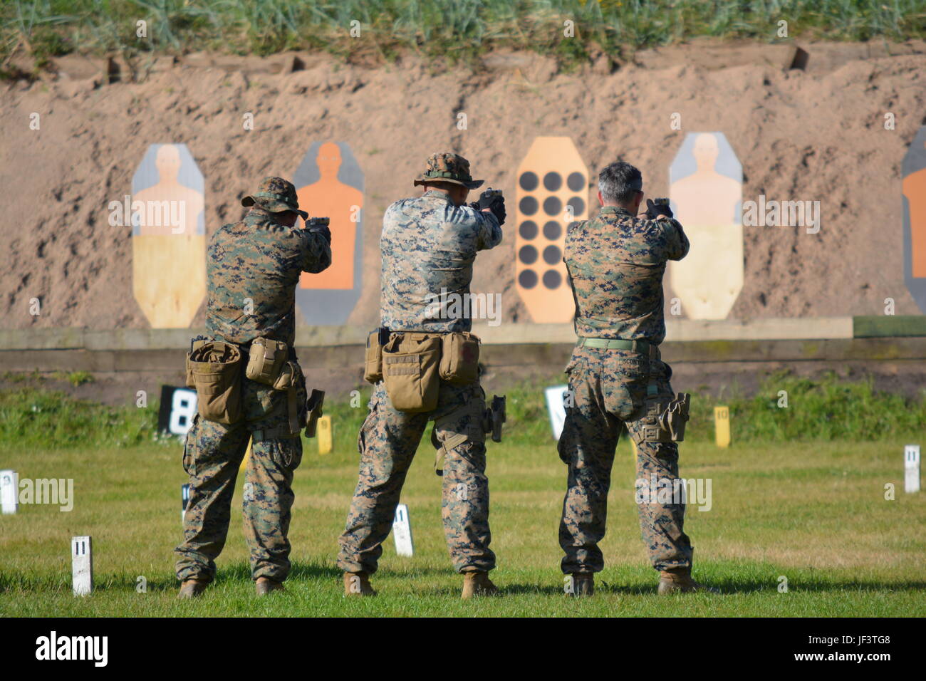 U.S. Marines from Combat Marksmanship Company conduct practice drills ...