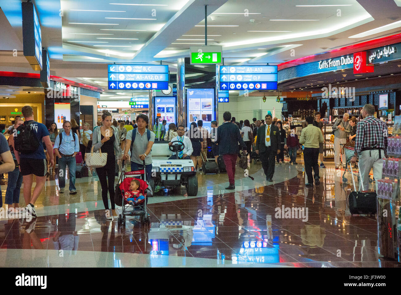 airport with shops at dubai Stock Photo Alamy
