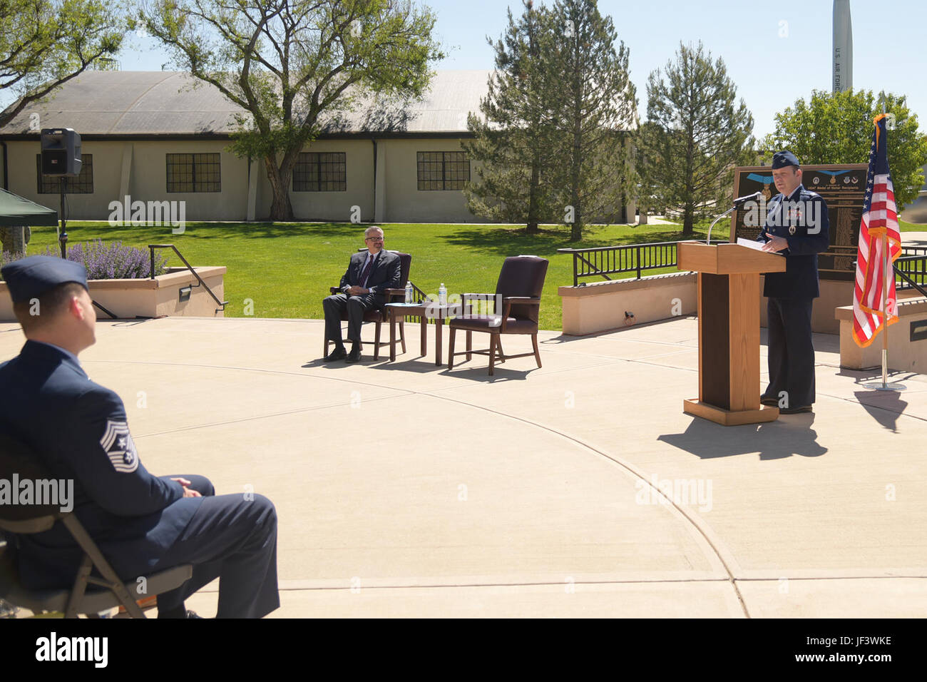 PETERSON AIR FORCE BASE, Colo. - Col. Doug Schiess, 21st Space Wing commander, speaks at the 21st SW’s 25th Anniversary Commemorative Event at the Peterson Air and Space Museum, May 25, 2017, at Peterson Air Force Base, Colo.  During the event, Schiess and Jeff Greene, Colorado Springs Mayor’s chief of staff, unveiled the time capsule that will be sealed after the event and opened on the wing’s 50th anniversary in 2042.  The 21st SW was activated May 15, 1992, under Air Force Space Command. (U.S. Air Force photo by Staff Sgt. Tiffany Lundberg) Stock Photo