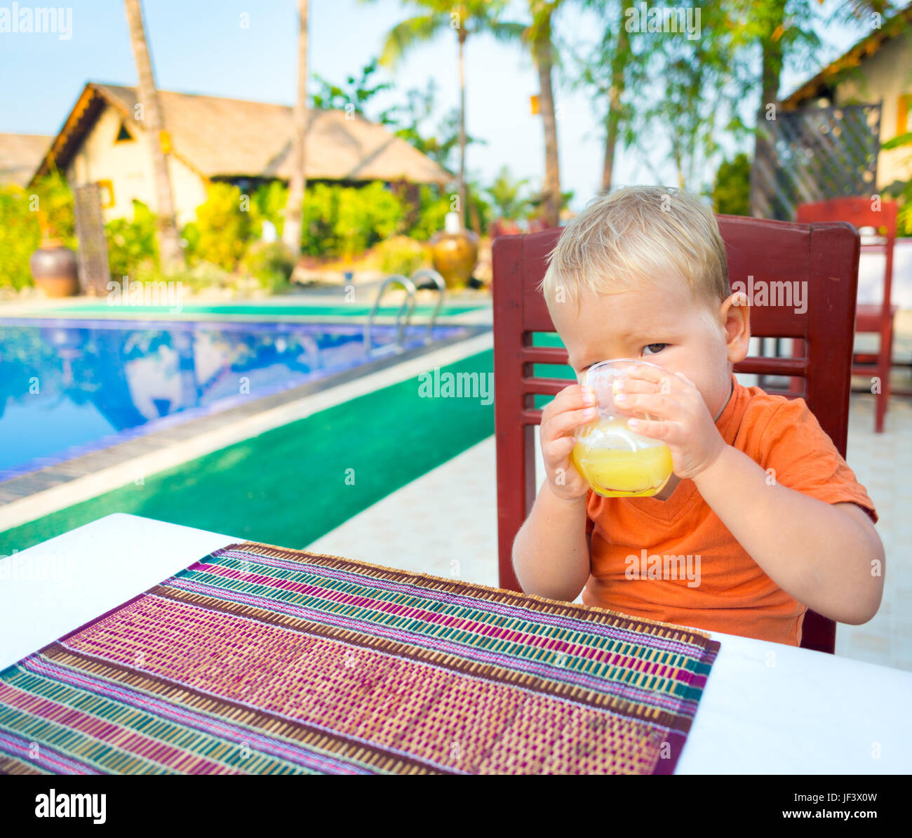 Child drinking juice Stock Photo Alamy