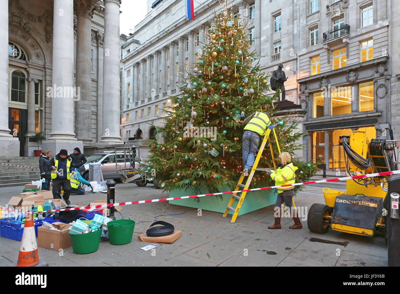 Decorating Christmas Tree in City Stock Photo