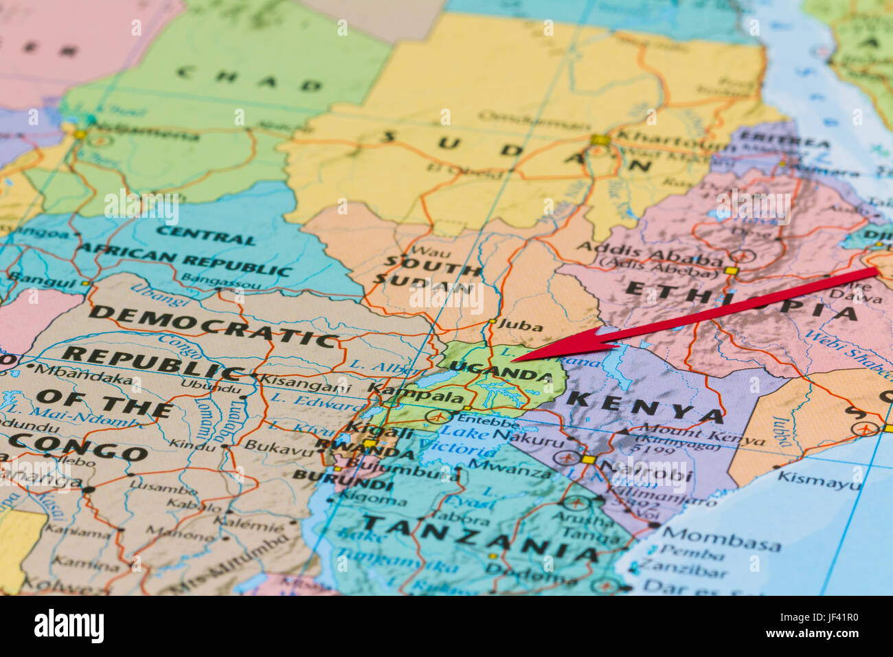Photo of Uganda. Country indicated by red arrow. Country on African continent. Stock Photo