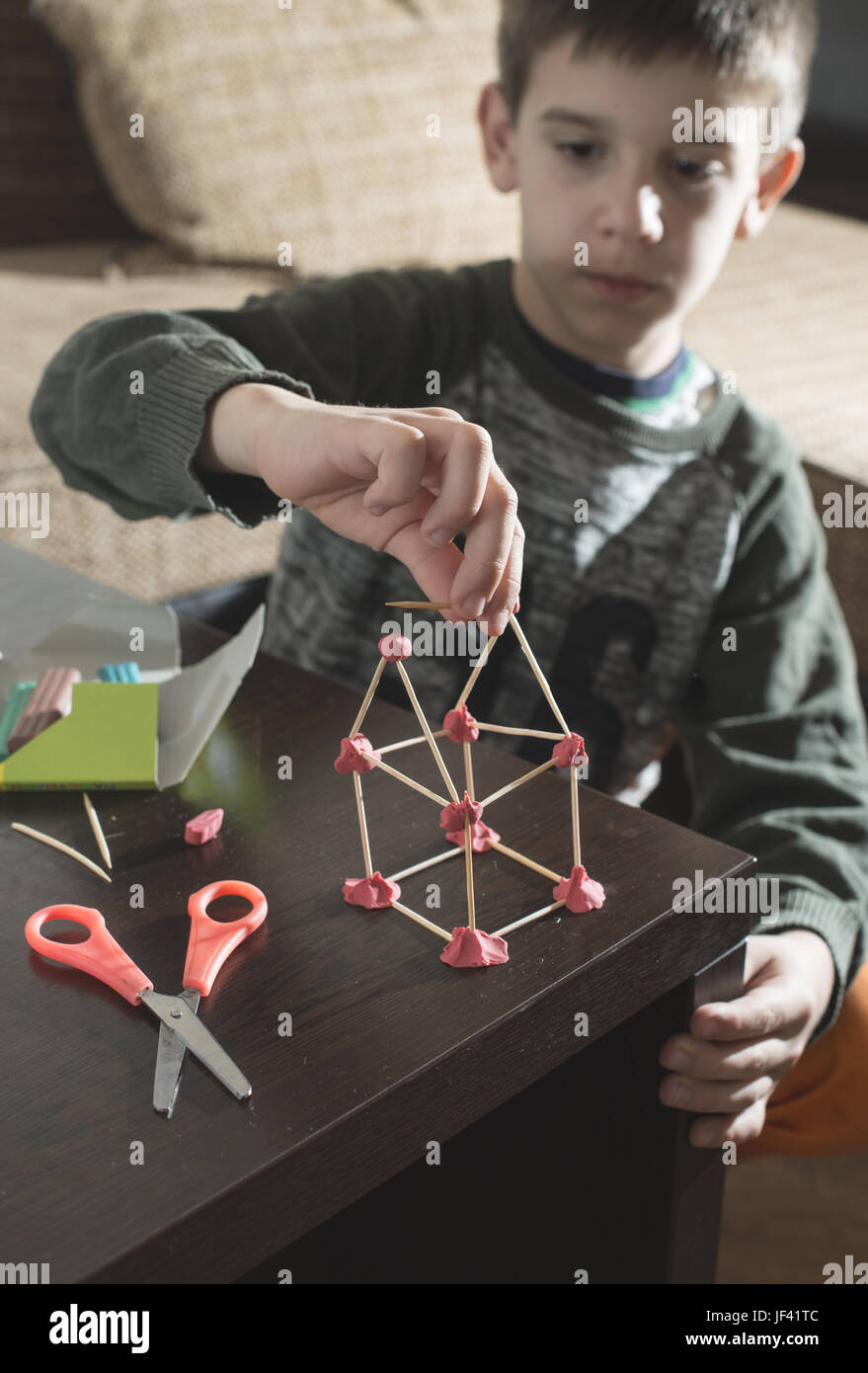 Child make house Stock Photo - Alamy