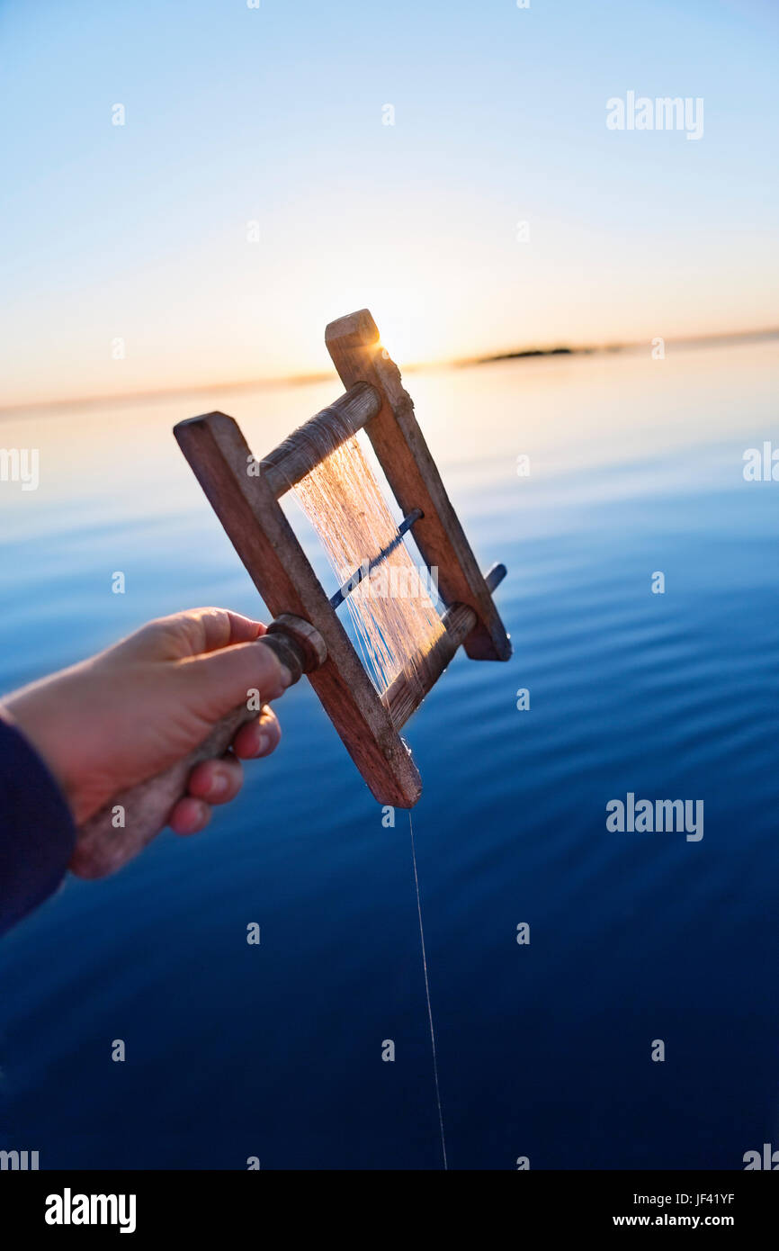 Handline Fishing Reel and Line Stock Photo - Alamy