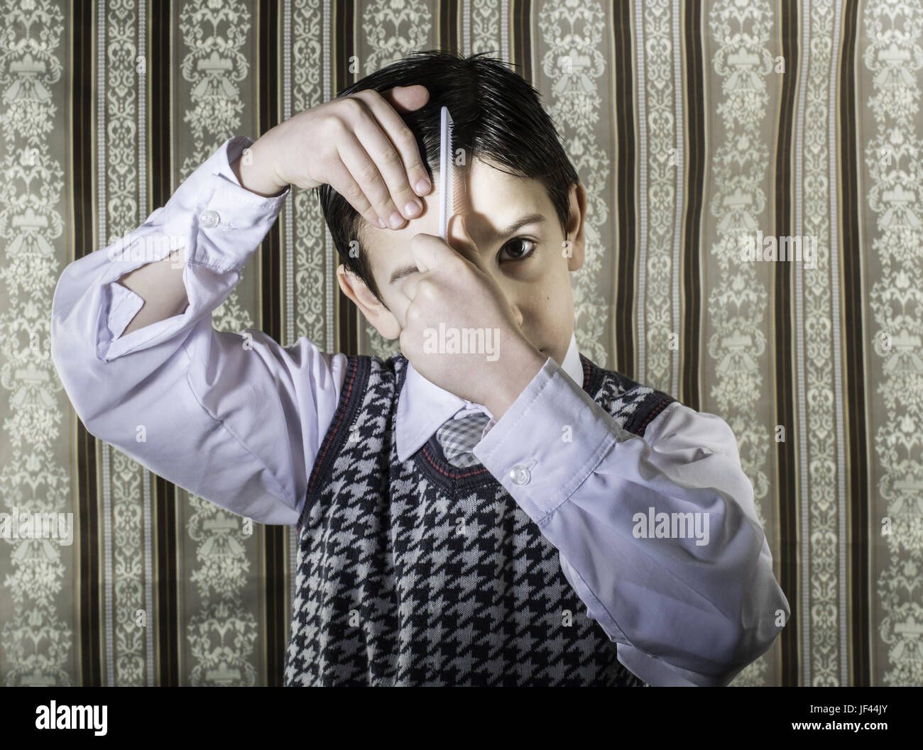 Child vintage clothes decided his hair Stock Photo Alamy