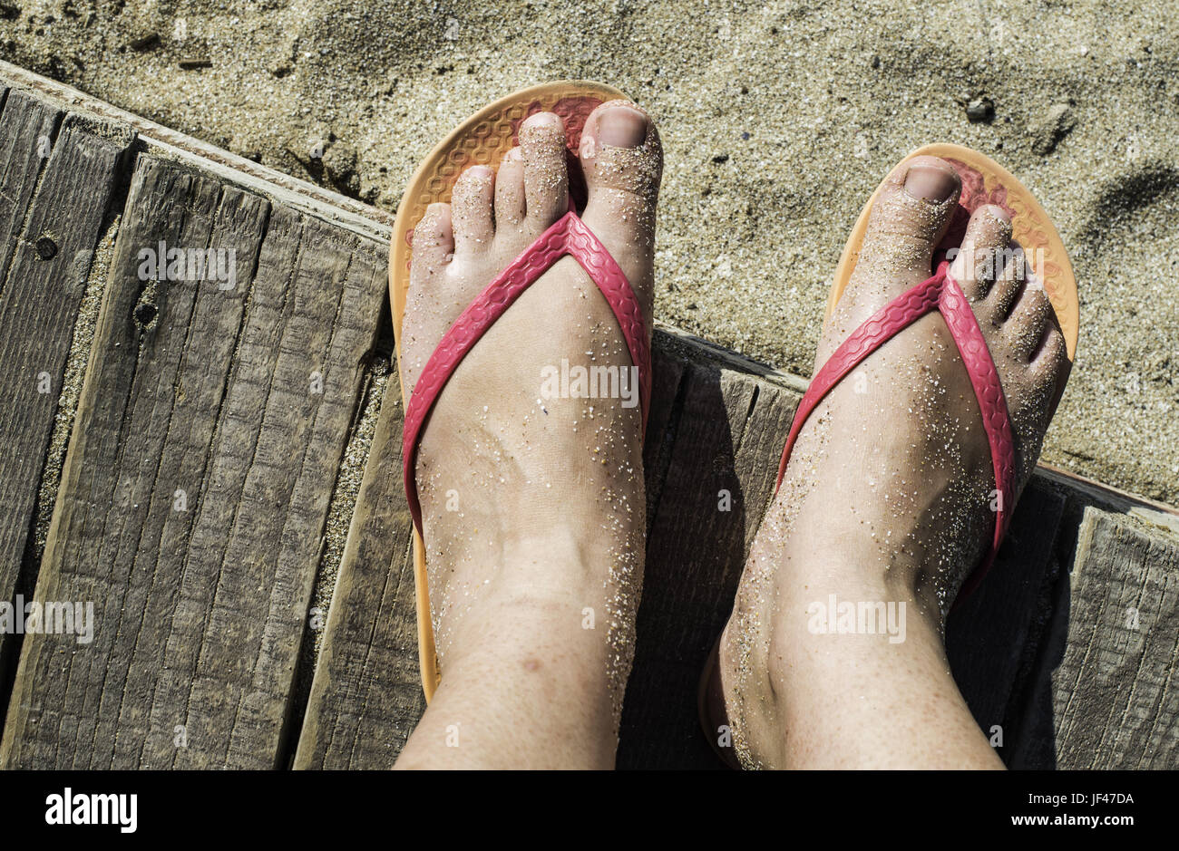 Women foots on the beach Stock Photo - Alamy