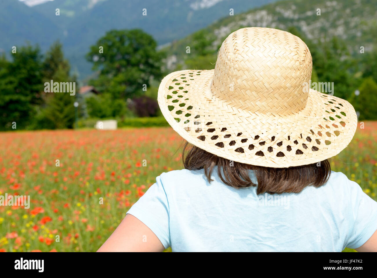 a young teenage girl in poppy field Stock Photo - Alamy
