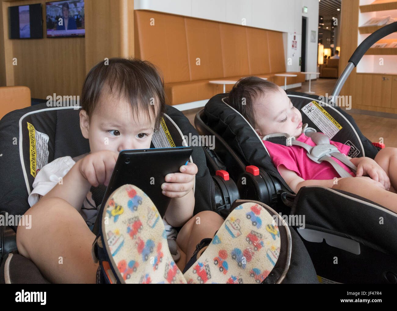 twins in stroller