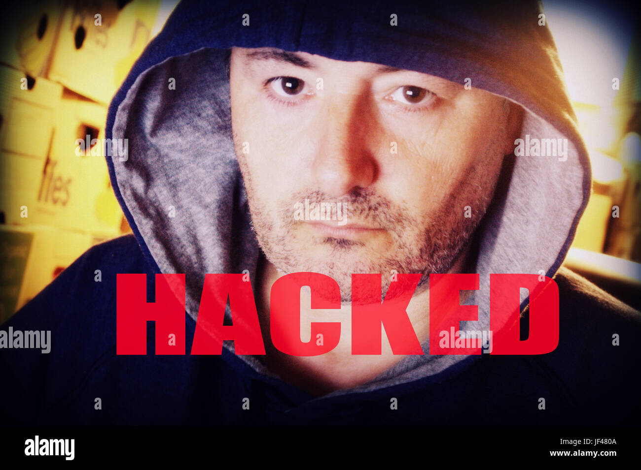 Hacker hacked victim perpetrator computer scam ransom ware terrorist terror Stock Photo
