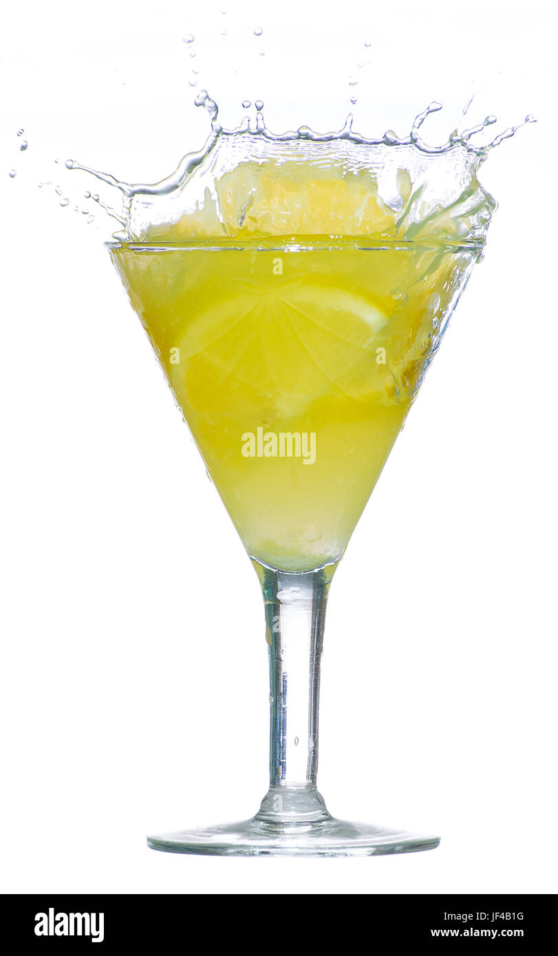 splashes of lemon juice on white background Stock Photo