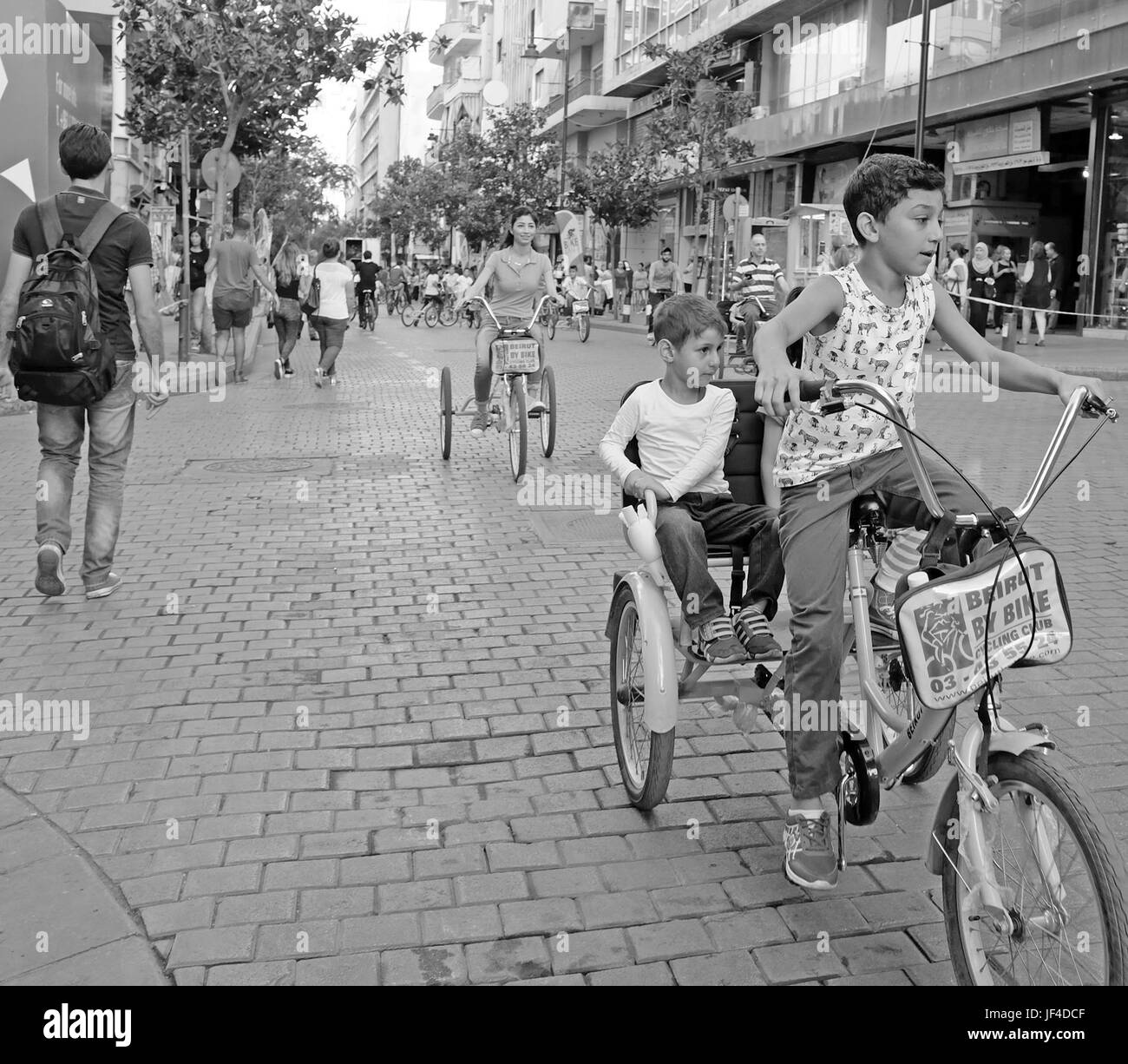 Lebanese take to Hamra Street in Beirut, Lebanon for biking day when scars are banned during hours. Stock Photo