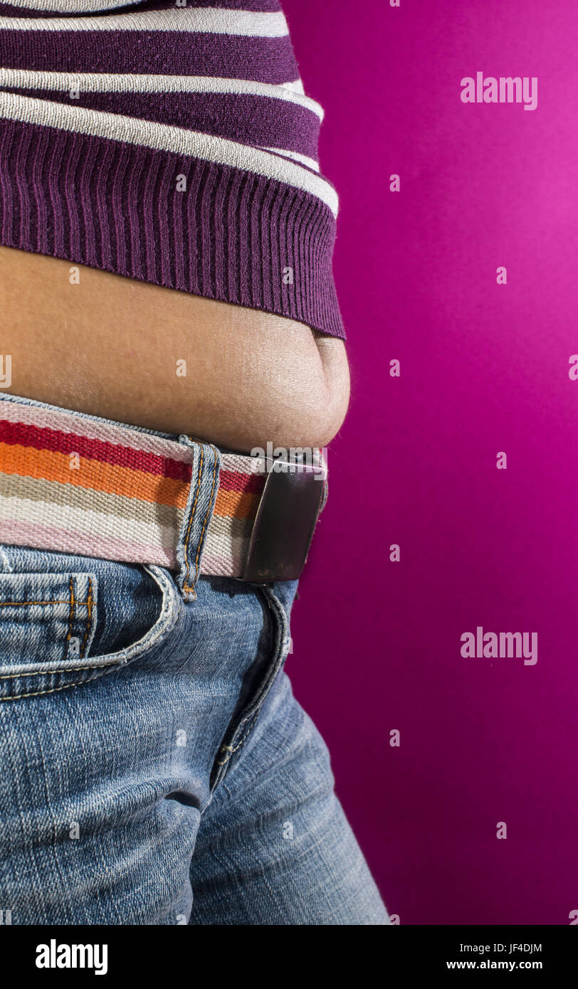 Woman with jeans shows her belly Stock Photo Alamy