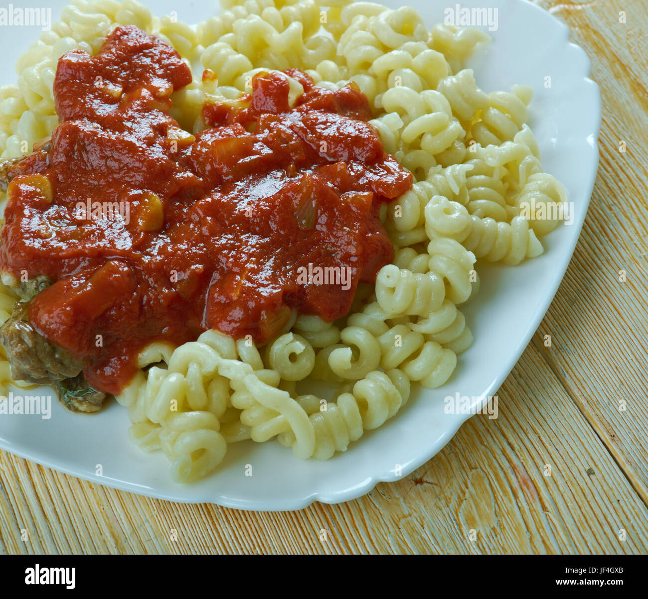 Fusilli in salsa rosa Stock Photo Alamy